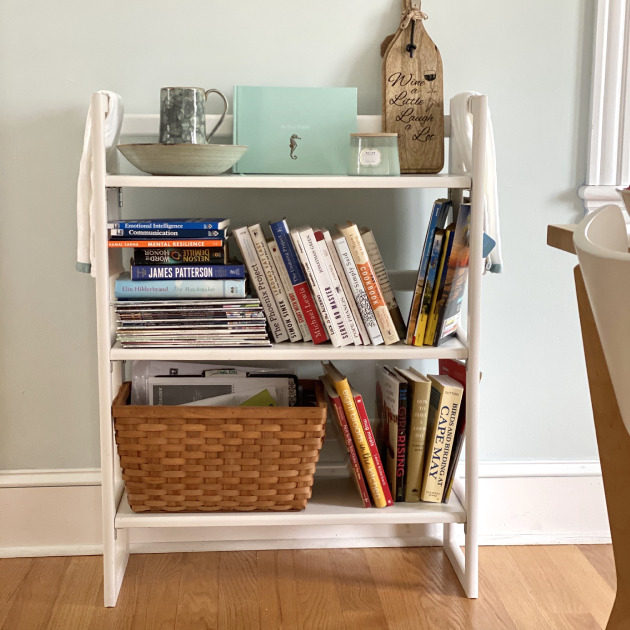 Small bookcase all cluttered up