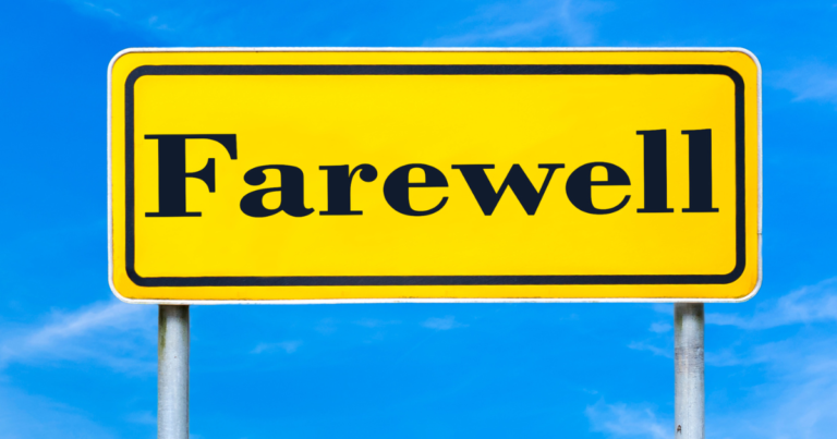 yellow road sign on two metal poles. Wording on sign is "Farewell". Blue sky in the background