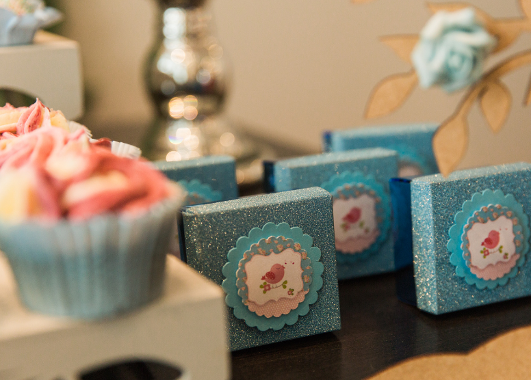 party favor boxes and cupcakes