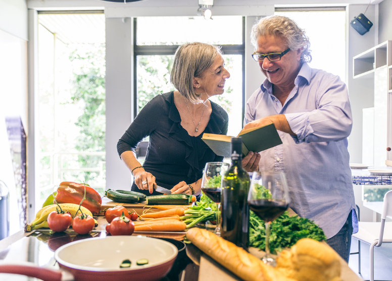 older couple cooking together