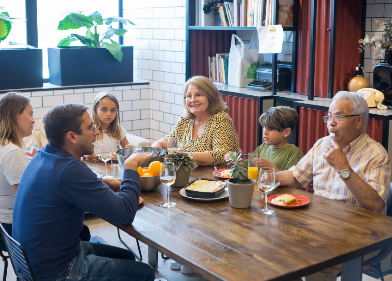 multi-generational family sharing a meal