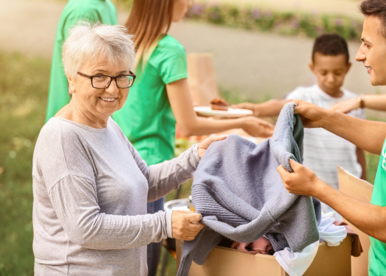 elderly woman helping out with volunteering