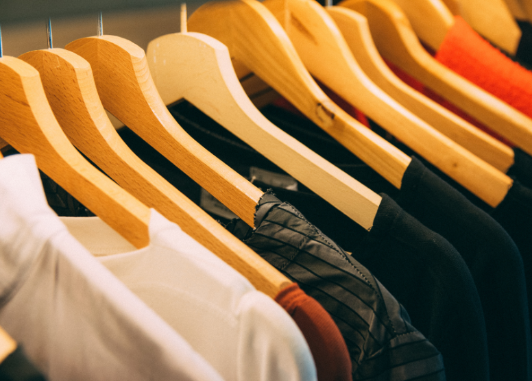 close up of clothing on hangers -- what to wear to a retirement party